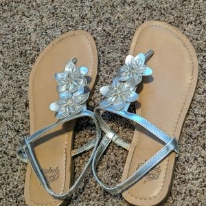Sandals with strap on back